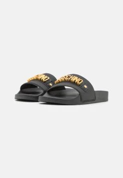 MOSCHINO Unisex - Muiltjes - Black/Gold 9 MOSCHINO Unisex - Muiltjes - Black/Gold -Algemene Winkel Voor Kindermode 628296cf803349d98590a34951a5d0eb